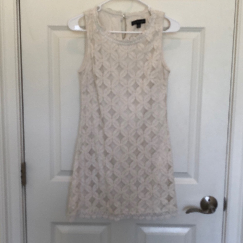 Almost anything cream dress
